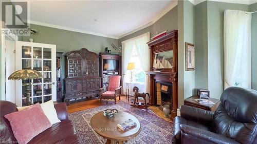 73399 London Road, Bluewater (Hay), ON - Indoor Photo Showing Living Room With Fireplace