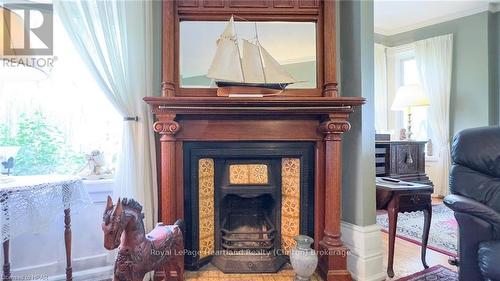 73399 London Road, Bluewater (Hay), ON - Indoor Photo Showing Living Room With Fireplace