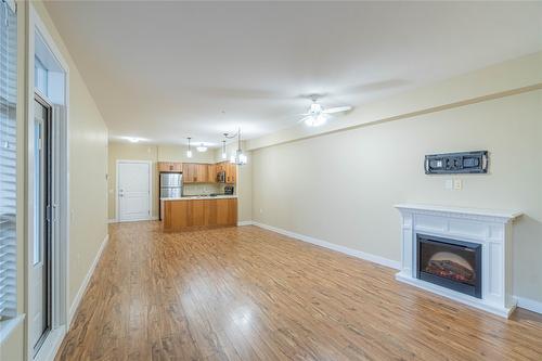 202-755 Mayfair Street, Kamloops, BC - Indoor Photo Showing Living Room With Fireplace