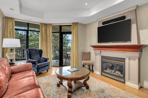 365 (L12)-1288 Water Street, Kelowna, BC - Indoor Photo Showing Living Room With Fireplace