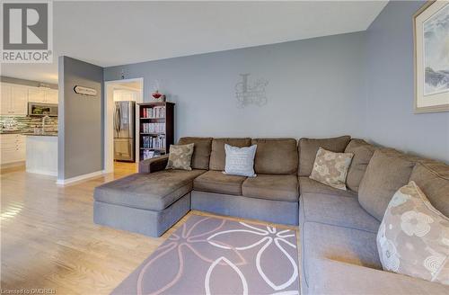 Living room with light hardwood / wood-style floors - 32 Triller Avenue, Cambridge, ON - Indoor Photo Showing Living Room