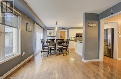 Dining area featuring light hardwood / wood-style floors and sink - 32 Triller Avenue, Cambridge, ON - Indoor Photo Showing Dining Room