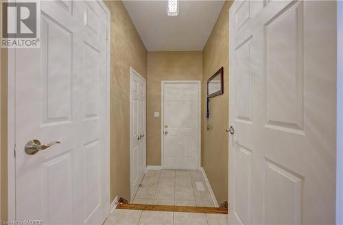 Hallway featuring light tile patterned floors - 32 Triller Avenue, Cambridge, ON - Indoor Photo Showing Other Room