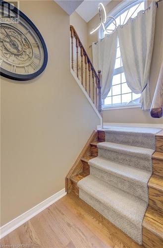 Staircase with wood-type flooring - 32 Triller Avenue, Cambridge, ON - Indoor Photo Showing Other Room