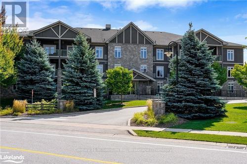 201 - 27 Beaver Street S, Blue Mountains (Thornbury), ON - Outdoor With Balcony With Facade