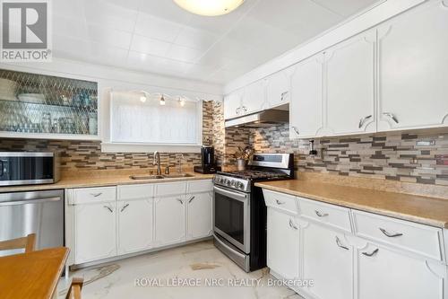 434 Scholfield Avenue N, Welland (773 - Lincoln/Crowland), ON - Indoor Photo Showing Kitchen With Double Sink