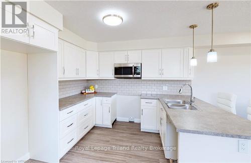 B - 135 Wimpole Street, West Perth (Mitchell), ON - Indoor Photo Showing Kitchen With Double Sink