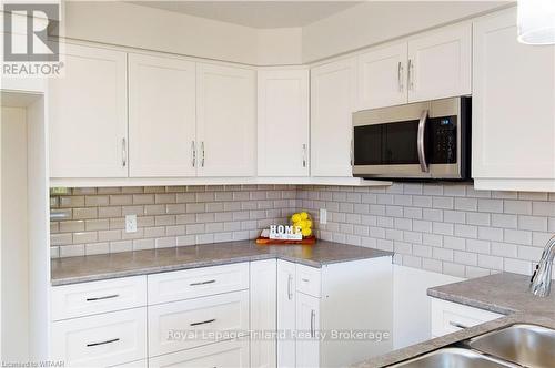 B - 135 Wimpole Street, West Perth (Mitchell), ON - Indoor Photo Showing Kitchen With Double Sink