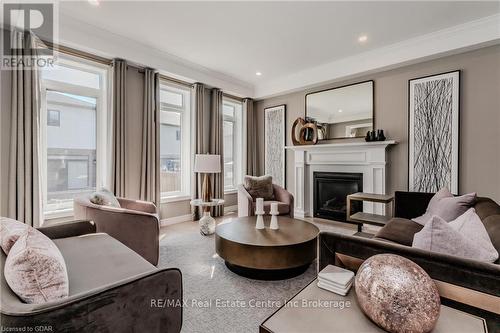 27 Spachman Street, Kitchener, ON - Indoor Photo Showing Living Room With Fireplace