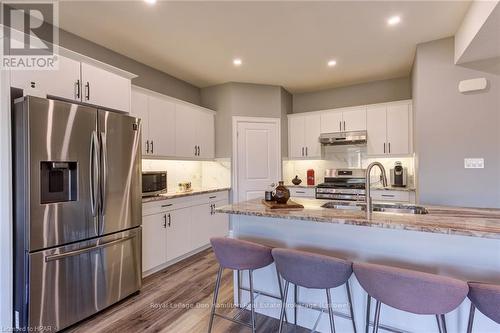 741 Hollinger Avenue, North Perth (32 - Listowel), ON - Indoor Photo Showing Kitchen With Double Sink With Upgraded Kitchen