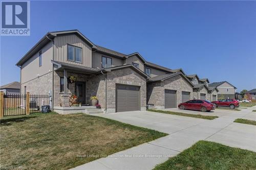 741 Hollinger Avenue, North Perth (32 - Listowel), ON - Outdoor With Facade