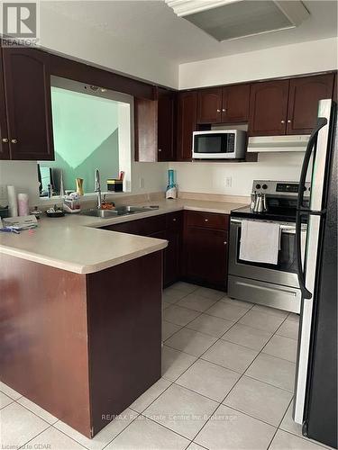 36 Raspberry Lane, Guelph (Grange Hill East), ON - Indoor Photo Showing Kitchen With Double Sink