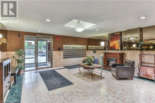 407 - 95 Baseline Road West, London, ON - Indoor Photo Showing Other Room With Fireplace