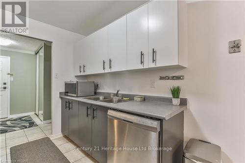 407 - 95 Baseline Road West, London, ON - Indoor Photo Showing Kitchen With Double Sink