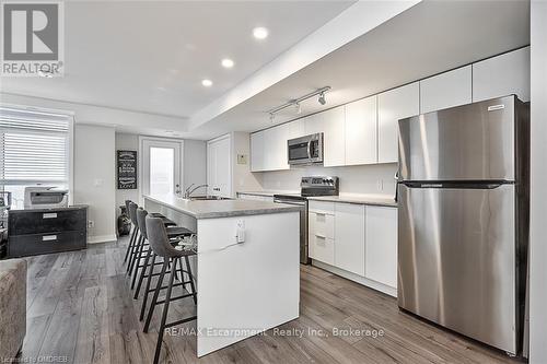 101 - 3058 Sixth Line, Oakville (1008 - Go Glenorchy), ON - Indoor Photo Showing Kitchen With Stainless Steel Kitchen