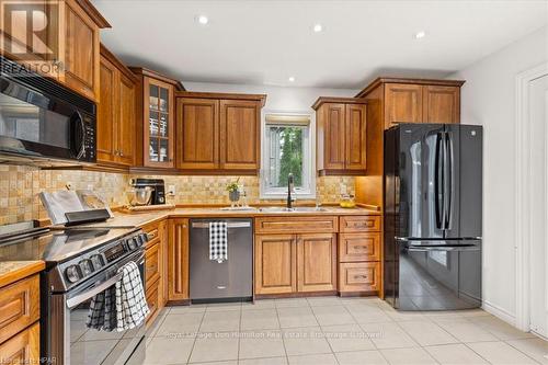 90 River Run Road, Mapleton (Drayton), ON - Indoor Photo Showing Kitchen With Double Sink