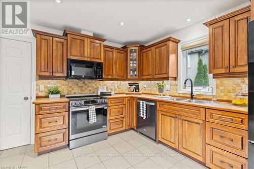 90 River Run Road, Mapleton (Drayton), ON - Indoor Photo Showing Kitchen With Double Sink