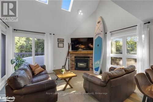 180 - 49 Trott Boulevard, Collingwood, ON - Indoor Photo Showing Living Room With Fireplace