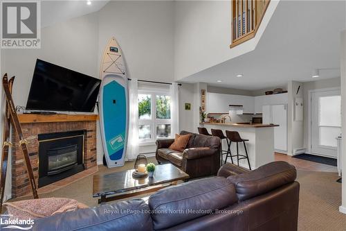 180 - 49 Trott Boulevard, Collingwood, ON - Indoor Photo Showing Living Room With Fireplace