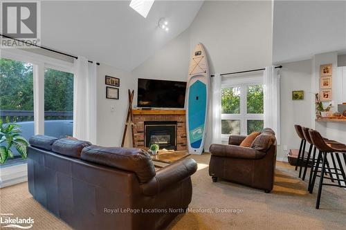 180 - 49 Trott Boulevard, Collingwood, ON - Indoor Photo Showing Living Room With Fireplace