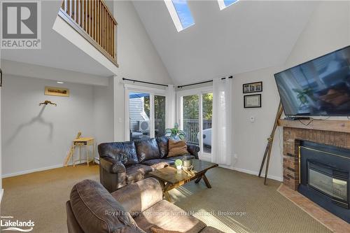 180 - 49 Trott Boulevard, Collingwood, ON - Indoor Photo Showing Living Room With Fireplace