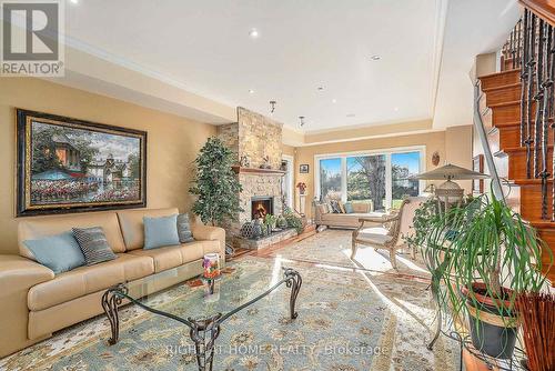 24 Doris Avenue, Ottawa, ON - Indoor Photo Showing Living Room With Fireplace