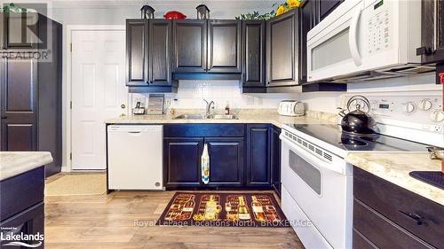 69 St James Place, Wasaga Beach, ON - Indoor Photo Showing Kitchen With Double Sink