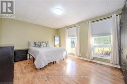 Bedroom featuring light wood-type flooring - 