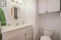 Bathroom featuring vanity and toilet - 