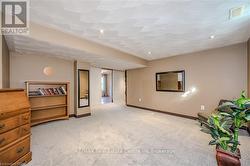 View of carpeted spare room - 