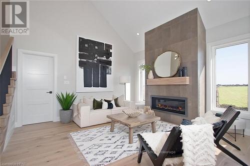 73590 Irene Crescent, Bluewater (Hay), ON - Indoor Photo Showing Living Room With Fireplace