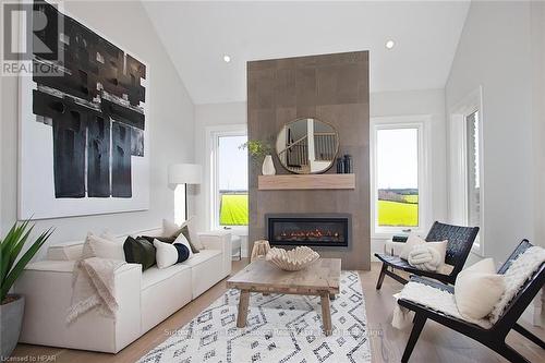 73590 Irene Crescent, Bluewater (Hay), ON - Indoor Photo Showing Living Room With Fireplace