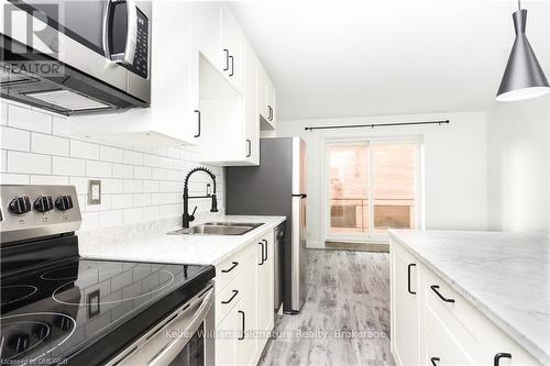 122 Victoria Avenue N, Hamilton (Landsdale), ON - Indoor Photo Showing Kitchen With Double Sink With Upgraded Kitchen