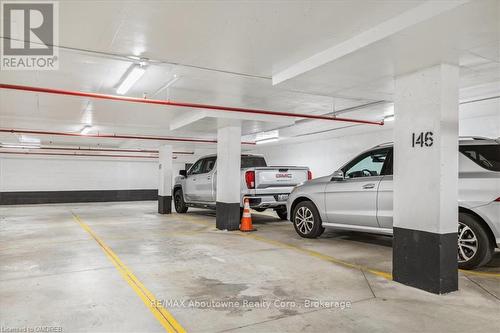 629 - 128 Grovewood, Oakville (1008 - Go Glenorchy), ON - Indoor Photo Showing Garage