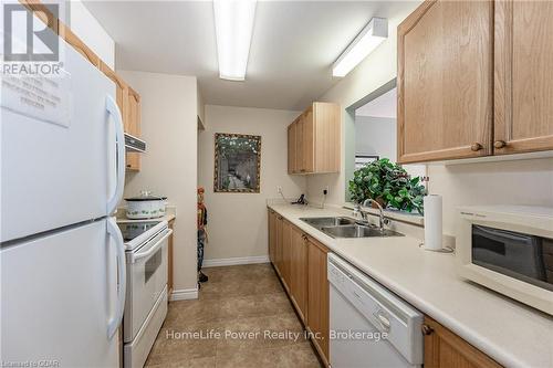 404 - 20 St George Street, Kitchener, ON - Indoor Photo Showing Kitchen With Double Sink