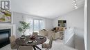 15 - 90 Ontario Street S, Lambton Shores, ON  - Indoor Photo Showing Dining Room With Fireplace 