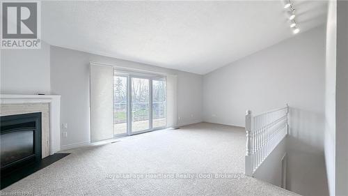 15 - 90 Ontario Street S, Lambton Shores, ON - Indoor With Fireplace