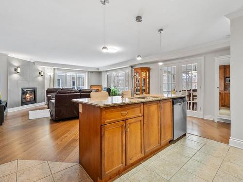 Overall view - 1131 Rue Du Sous-Bois, Longueuil (Le Vieux-Longueuil), QC - Indoor Photo Showing Kitchen With Fireplace