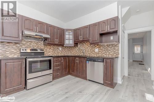 69 Laing Street, Toronto (Greenwood-Coxwell), ON - Indoor Photo Showing Kitchen With Upgraded Kitchen