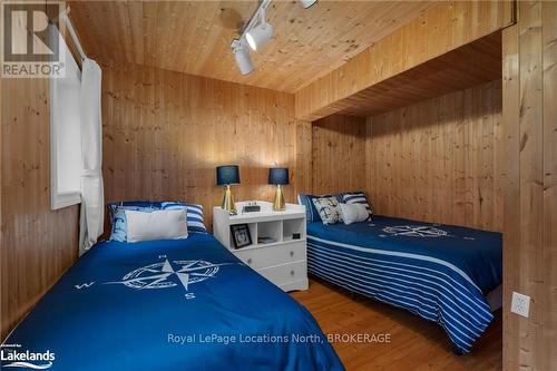 1433 South Horn Lake Road, Ryerson, ON - Indoor Photo Showing Bedroom