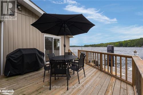 1433 South Horn Lake Road, Ryerson, ON - Outdoor With Body Of Water With Deck Patio Veranda With Exterior