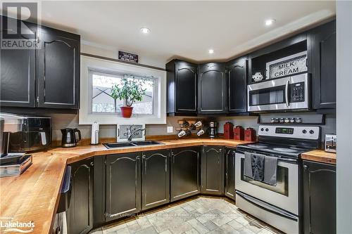 1922 Highway 141, Muskoka Lakes (Watt), ON - Indoor Photo Showing Kitchen With Double Sink