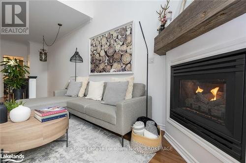 3 - 110 Kellie'S Way, Blue Mountains (Blue Mountain Resort Area), ON - Indoor Photo Showing Living Room With Fireplace