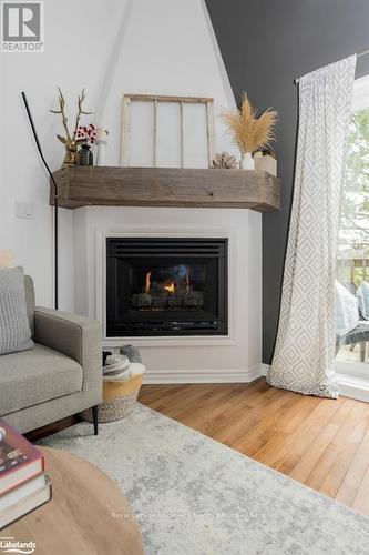 3 - 110 Kellie'S Way, Blue Mountains (Blue Mountain Resort Area), ON - Indoor Photo Showing Living Room With Fireplace