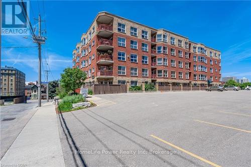 506 - 20 St George Street, Kitchener, ON - Outdoor With Balcony With Facade