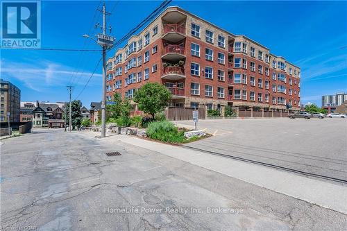 506 - 20 St George Street, Kitchener, ON - Outdoor With Balcony With Facade