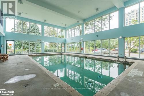 305 - 65 Ellen Street, Barrie (City Centre), ON - Indoor Photo Showing Other Room With In Ground Pool