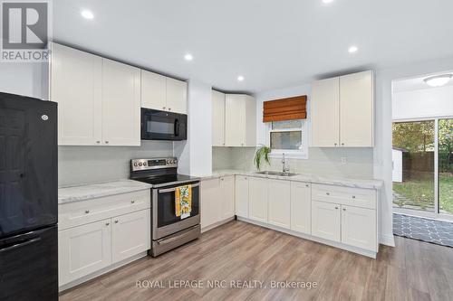 102 Pine Street S, Thorold (557 - Thorold Downtown), ON - Indoor Photo Showing Kitchen With Double Sink