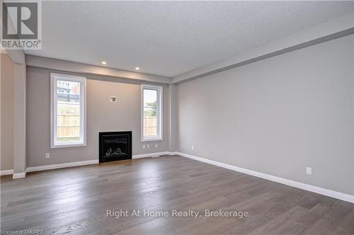 442 Westhaven Street, Waterloo, ON - Indoor Photo Showing Living Room With Fireplace