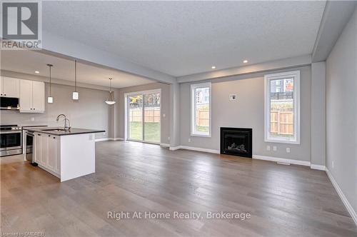 442 Westhaven Street, Waterloo, ON - Indoor With Fireplace